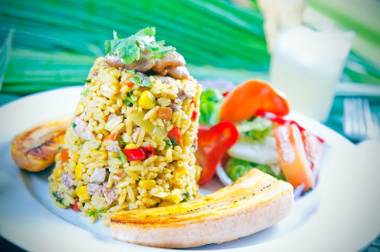 Travelers could rediscover their love of Arroz Con Pollo in Costa Rica