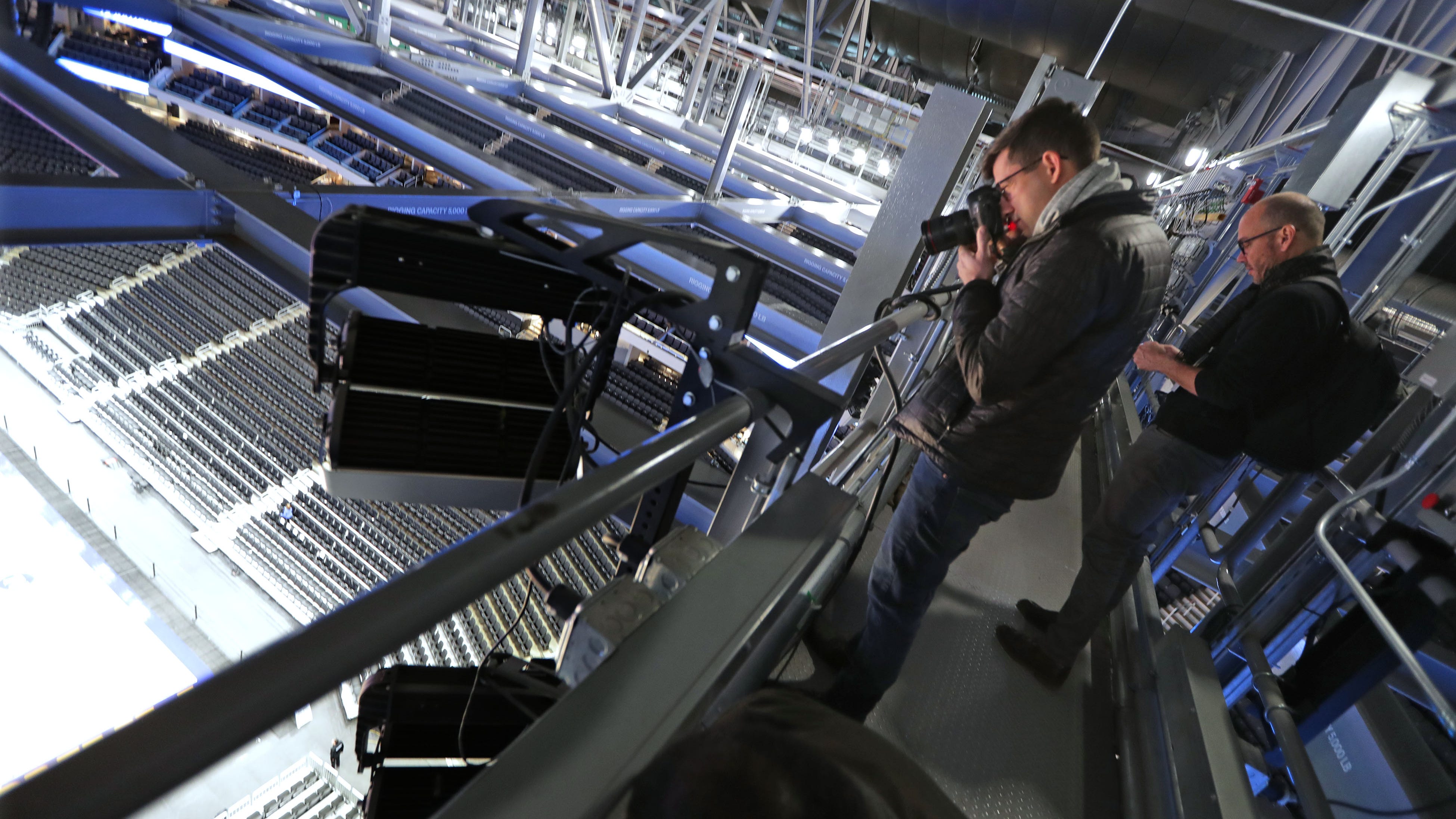 Members of the media get a look at  Fiserv Forum from the catwalk during a tour as part of the 2020 Democratic National Convention winter media walk-through on Tuesday.