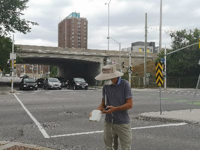 Sierra Club Canada Foundation''s Jake Cole tests an air quality monitor in Ottawa