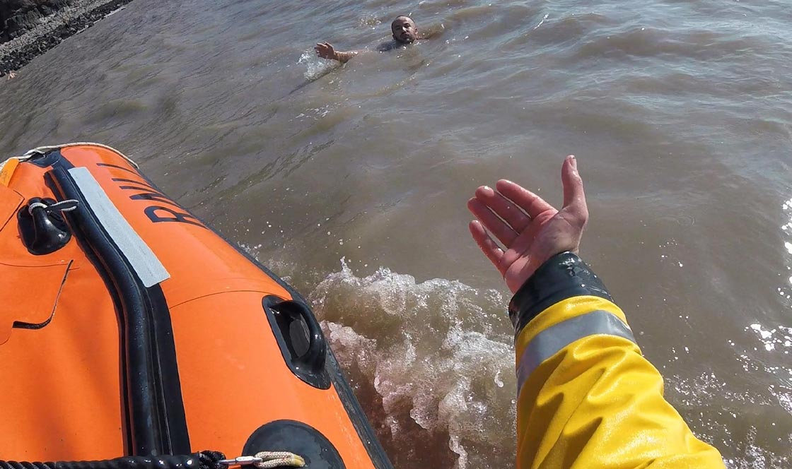 Weston-super-Mare lifeboat crew rescue a man from the water