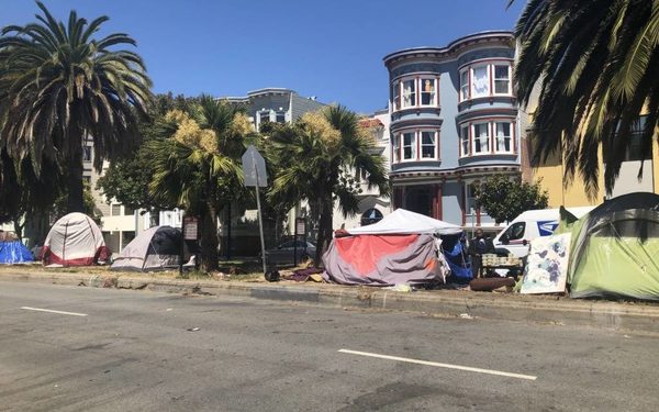 Tent encampment set up along a median at 16th Street and Dolores.