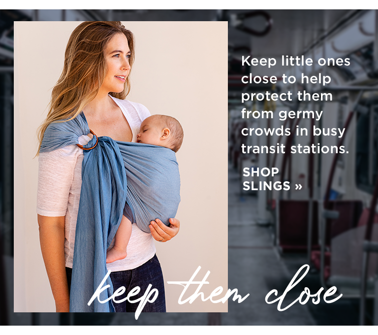 Keep little ones close to help protect them from germy crowds in busy transit stations. shop slings | keep them close
