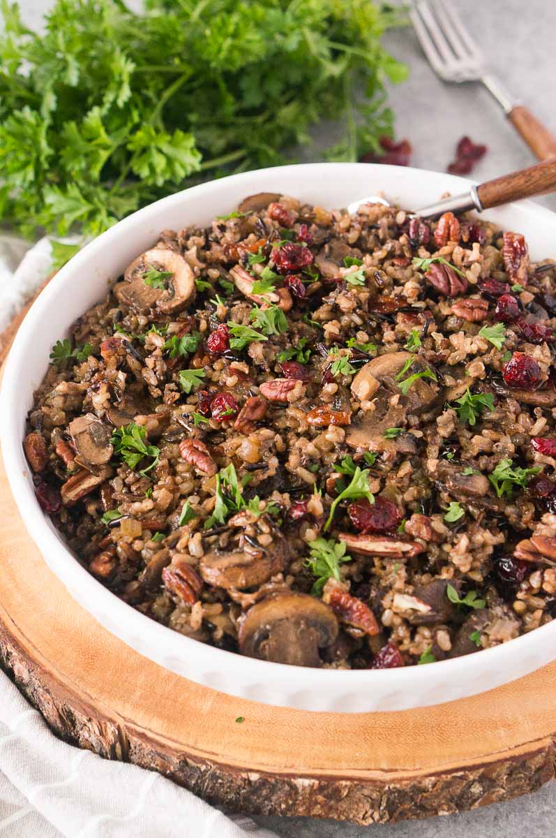 wild rice with mushrooms pilaf recipe in a white bowl