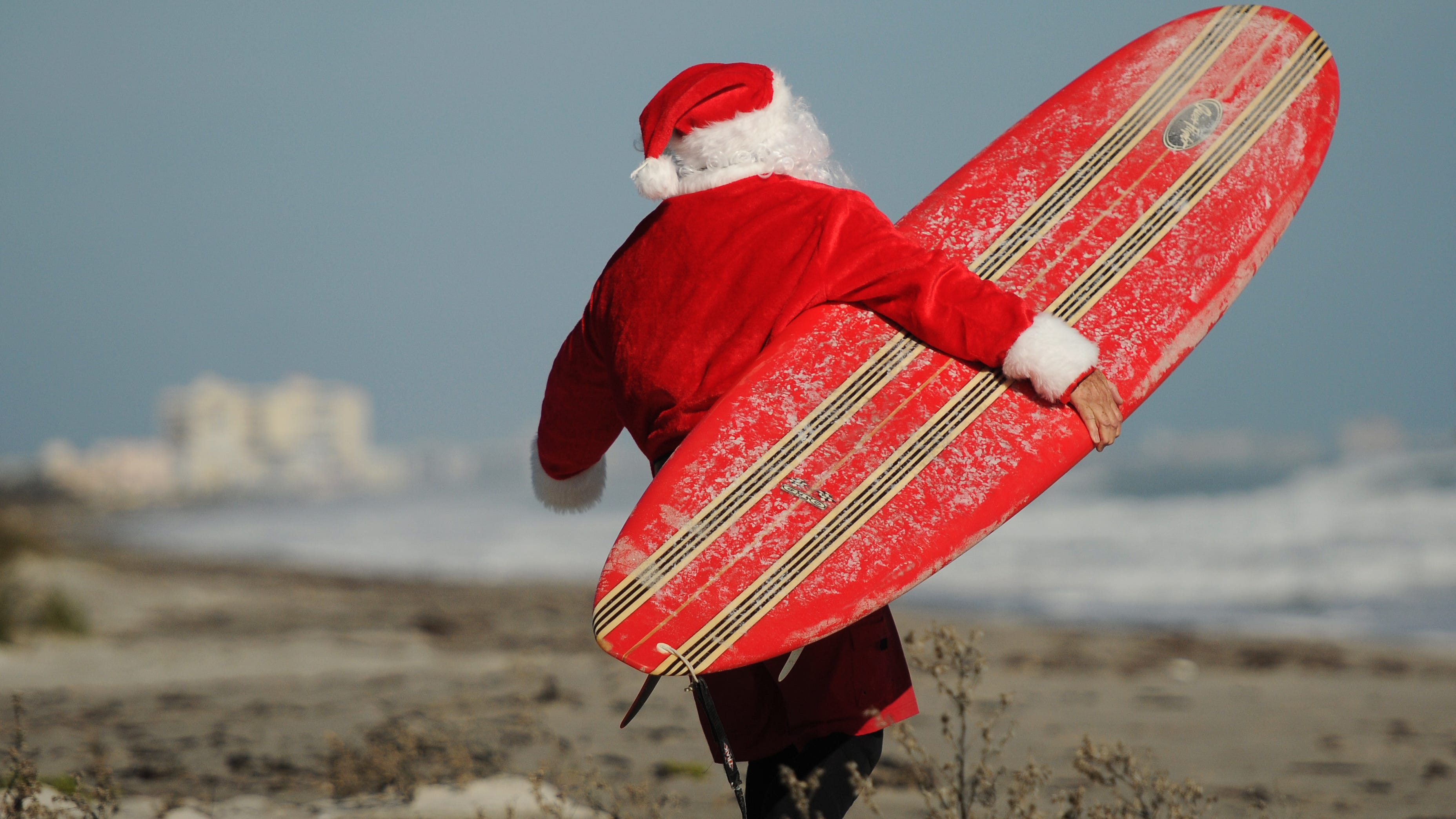 The Surfing Santas event takes place at the Cocoa 
