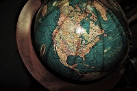 an oldschool globe turned to show North and South America