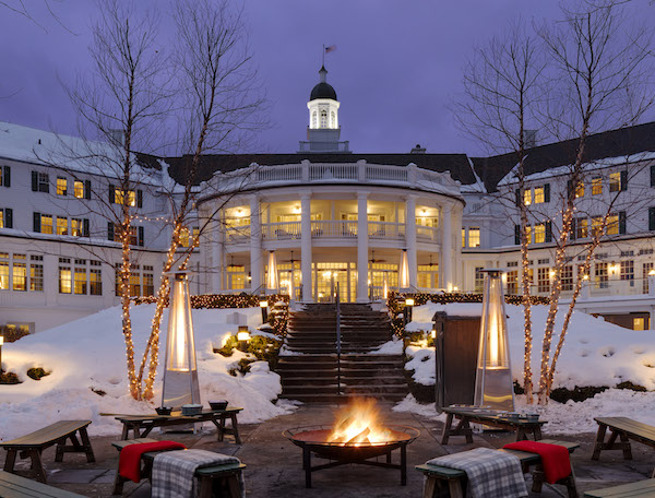 Winter exterior view of The Sagamore Resort at dusk