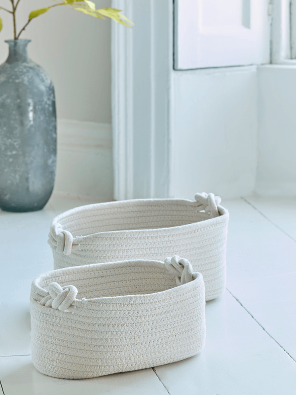 Two Cream Woven Baskets