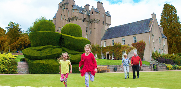 A family enjoys a visit to Crathes Castle, Garden & Estate in autumn