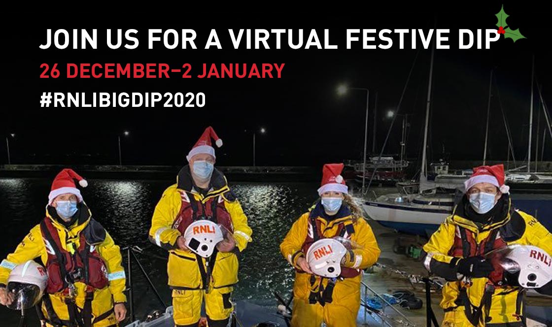 Lifeboat crew members wearing Santa hats and face masks. Photo: Martin Macnamara