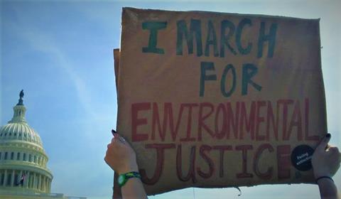 I march for environmental justice sign