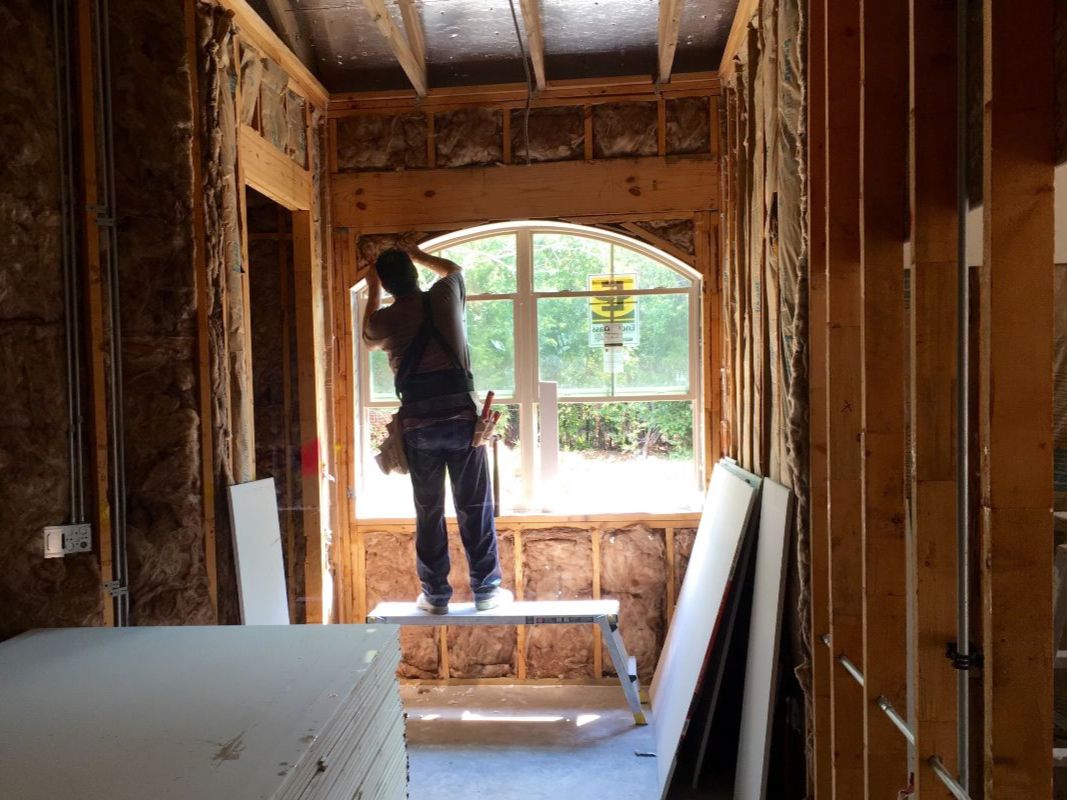 Construction Worker Working on New Building