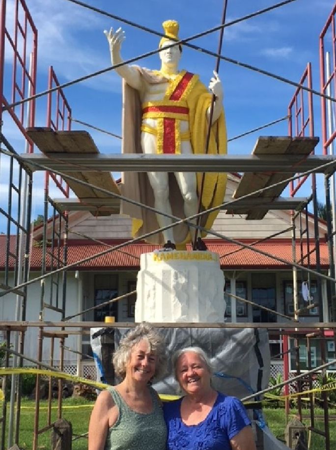 Sharon Hayden (right) stands before the statue with colleague Christine Richardson.