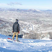 Snowboarder enjoying the view at Hunter Mountain