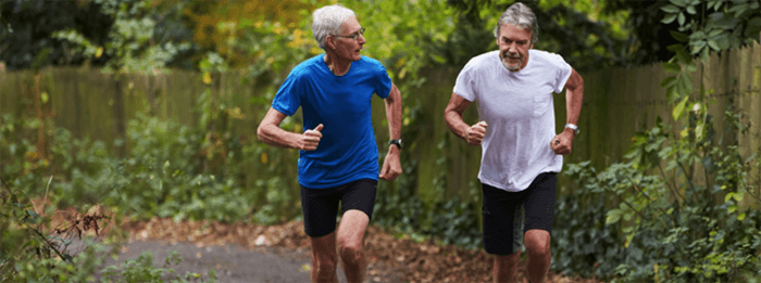 Two men running outdoors