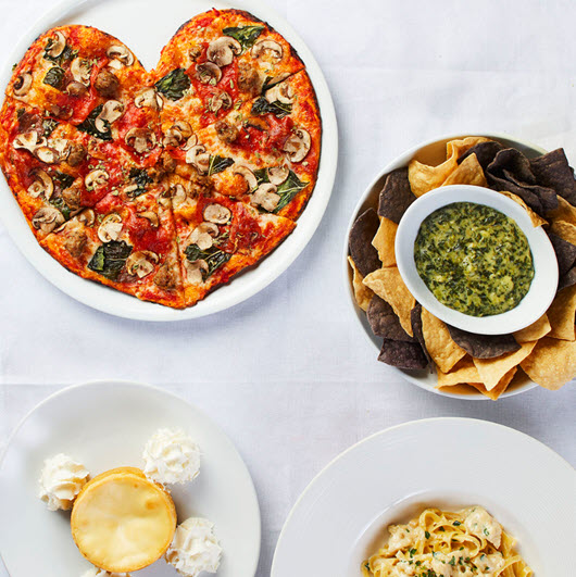 CPK heart-shaped pizza next to other menu items