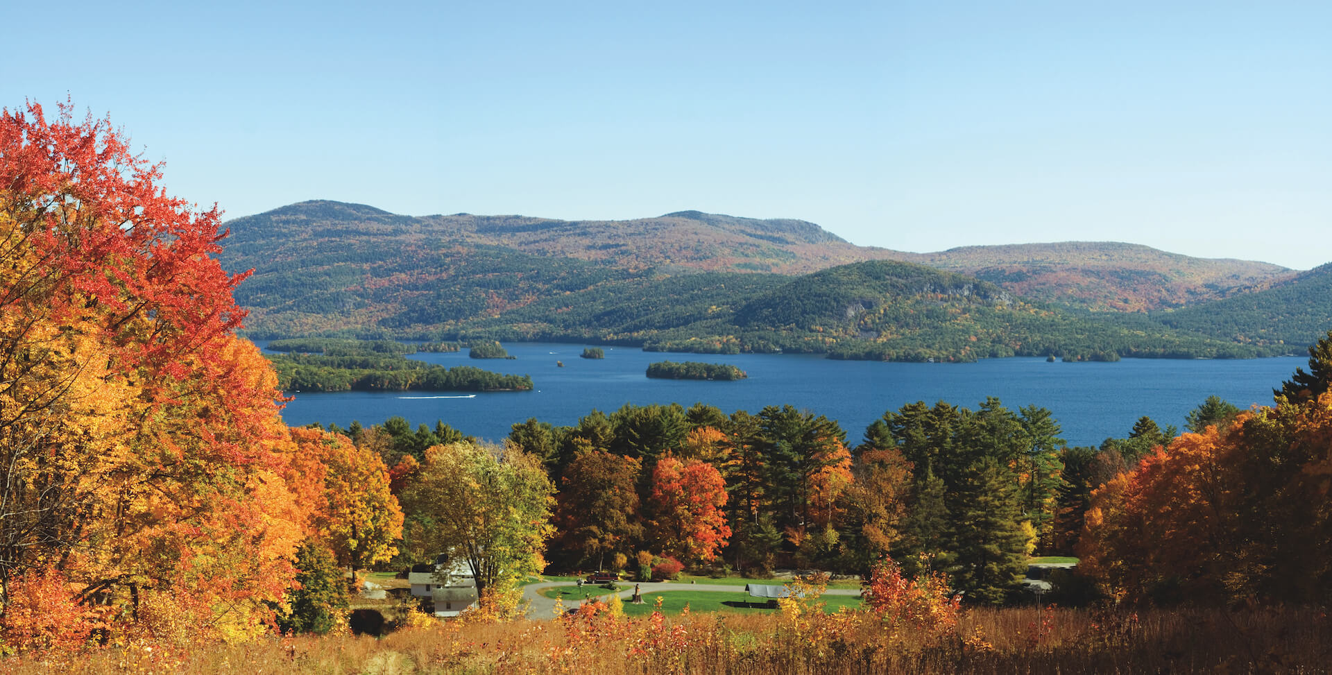 Scenic aerial shot of the foliage surrounding Lake George
