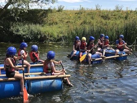 Young people rafting