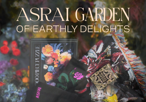 A floral backdrop features a collection of Asrai gifts. The header reads: Asrai Garden of Earthly Delights. Smoke wafts across the screen. The gift collection features a woven floral blanket, colorful floral Asrai Garden puzzle, black snake tube socks, Royal Optik playing cards and etched rocks glass