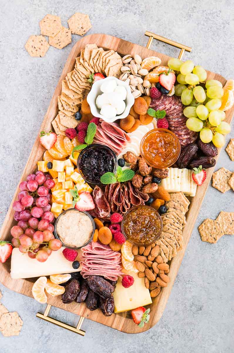 charcuterie board idea - cheese and meat board served with crackers