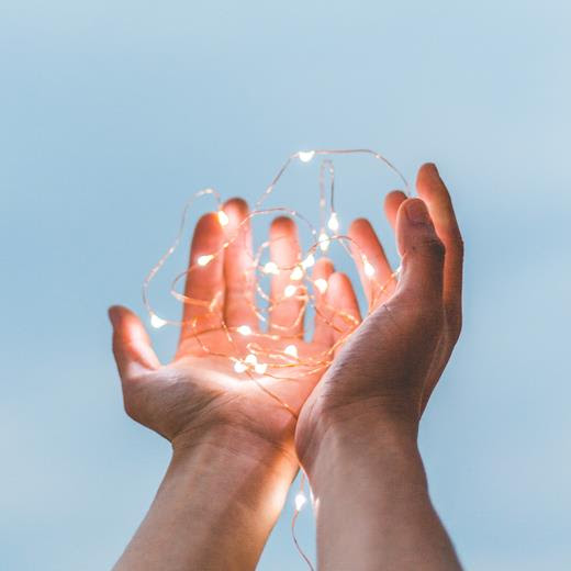 hands with sparkles