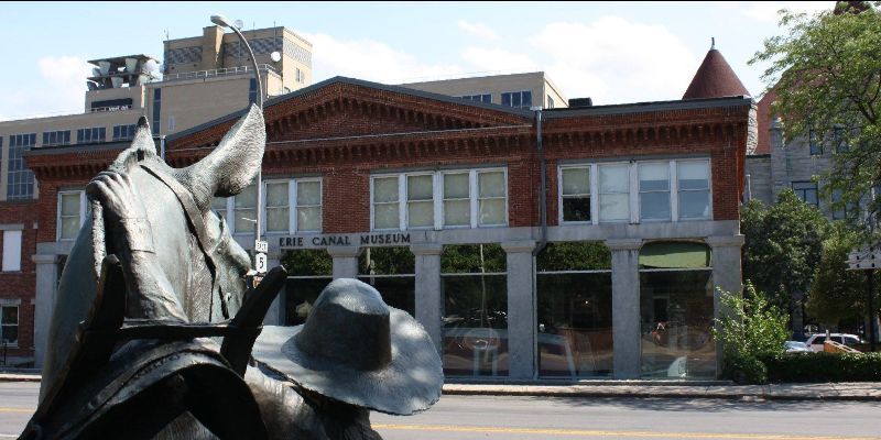 Erie Canal Museum with mule statue in foreground