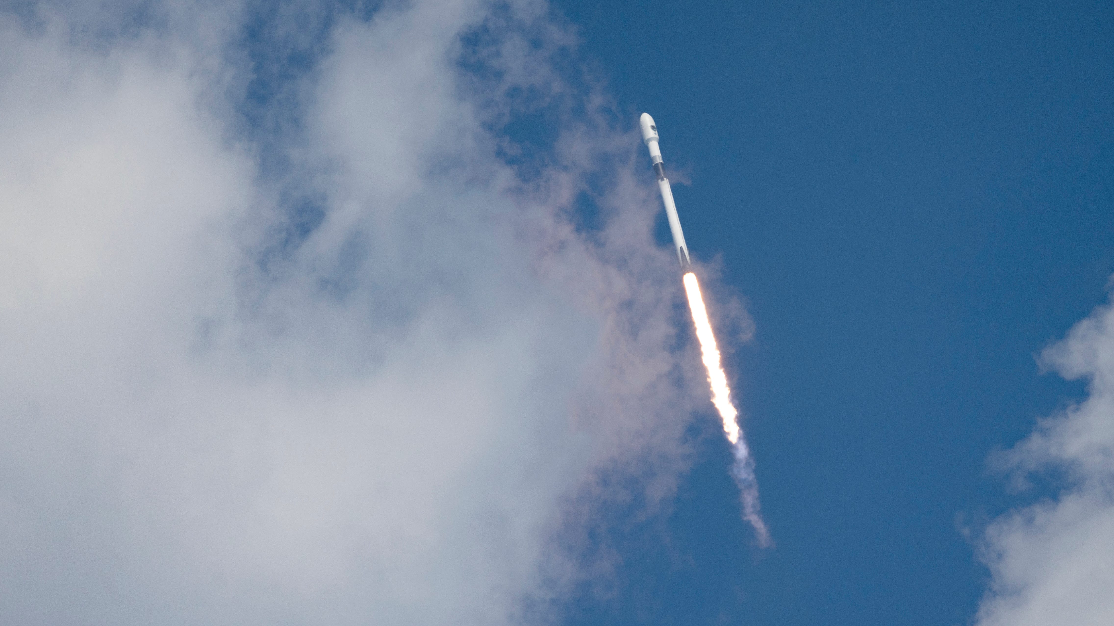A SpaceX Falcon 9 rocket flies over the Atlantic O
