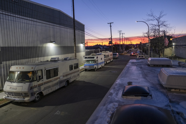 Sun setting behind RVs parked in Berkeley