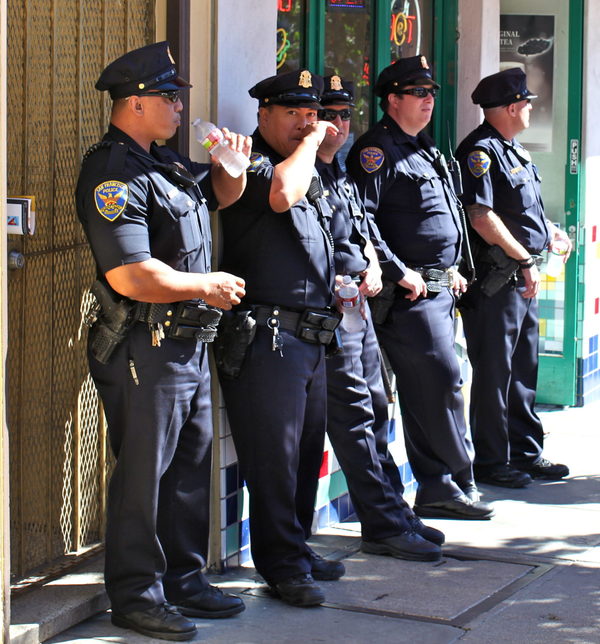 San Francisco police officers at the Castro Street Fair in 2012. torbakhopper / CC-BY-2.0