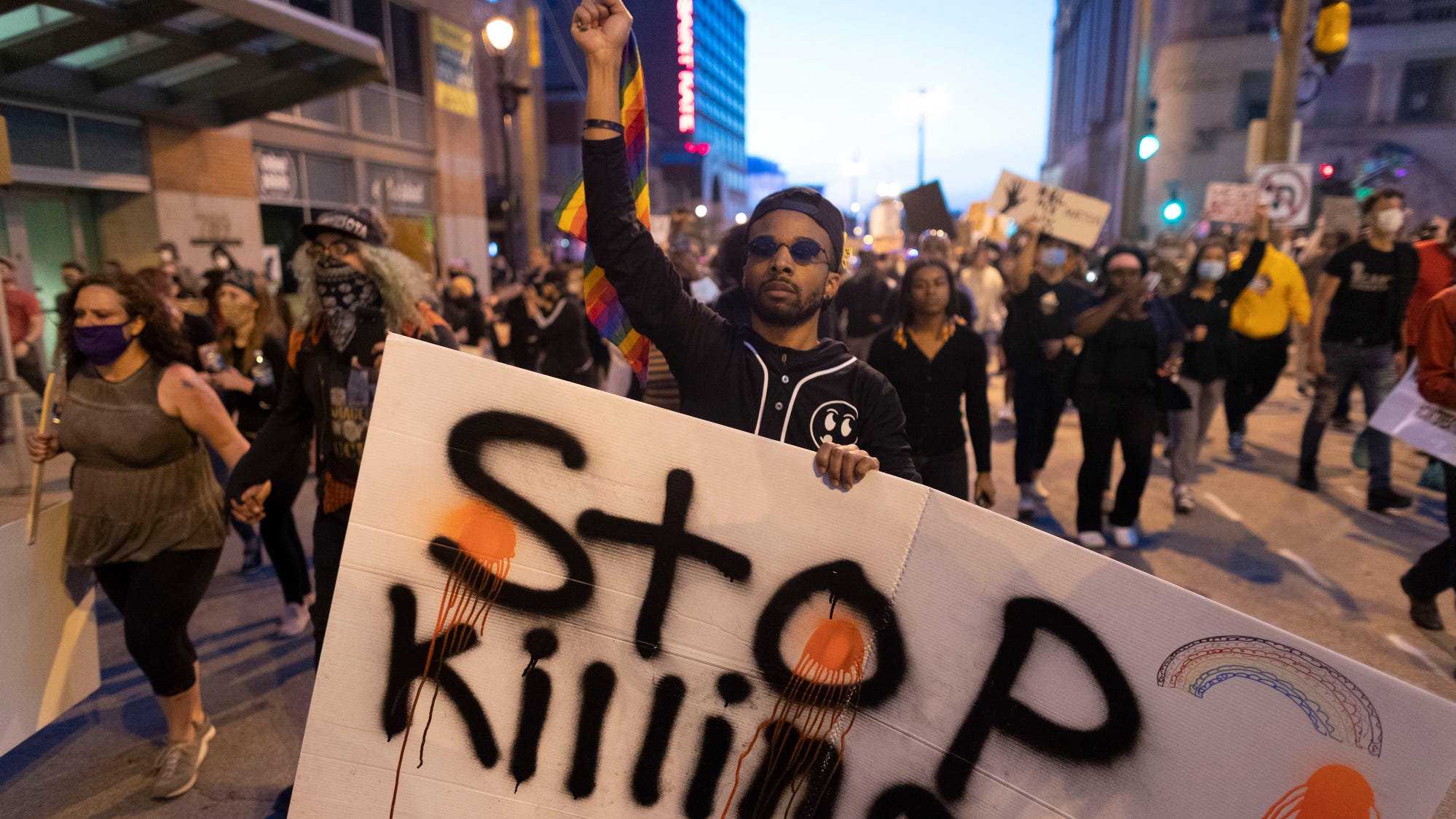 A group of about couple thousand people march and  protest peacefully Monday, June 1, 2020 in downtown Milwaukee, Wis. They were joined by cars blocking traffic. Police monitored the group, but it appears there were no arrests.

MARK HOFFMAN/MILWAUKEE JOURNAL SENTINEL