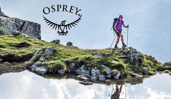 image: female hiking using an Osprey backpack