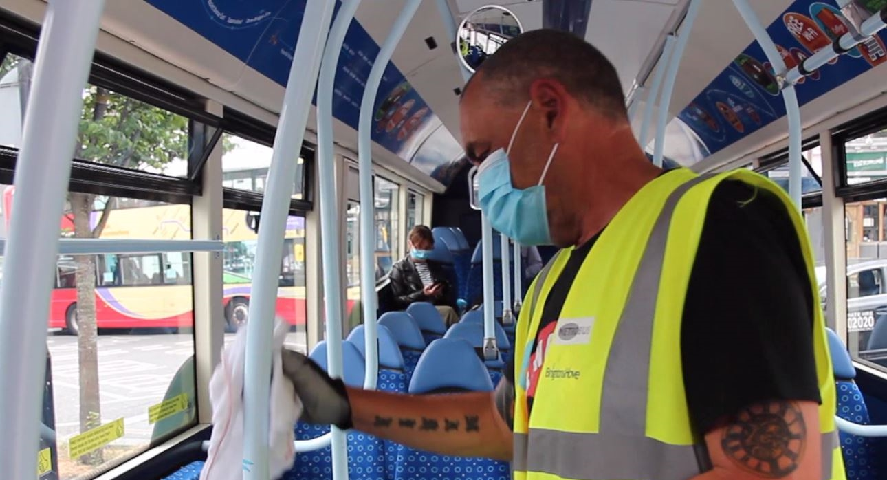 Man cleaning the bus