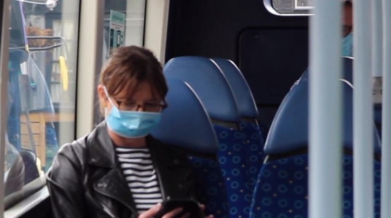 passenger wearing a face mask