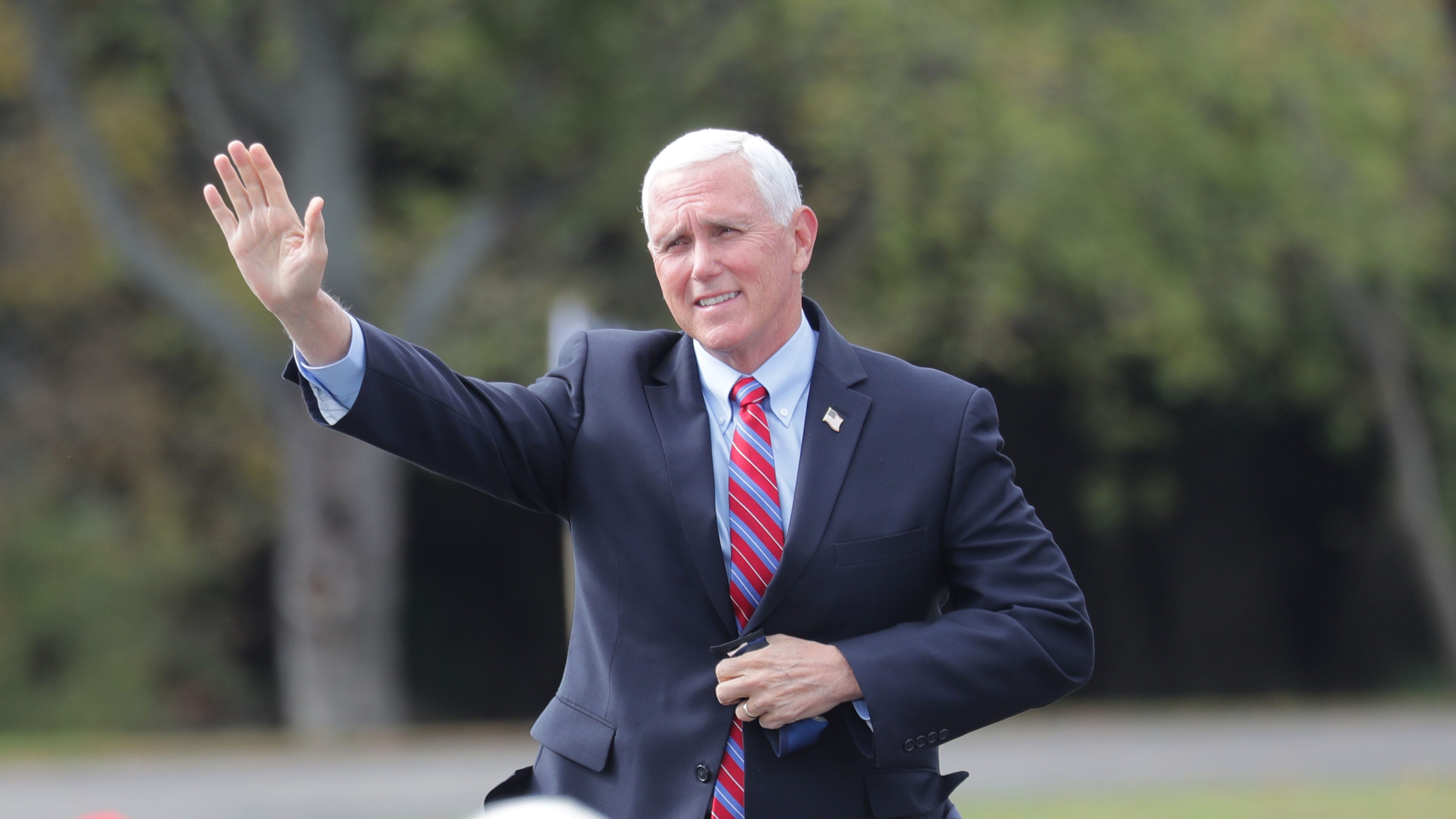 Vice President Mike Pence acknowledges applause during a campaign event at Weldall Manufacturing in Waukesha  on Tuesday, Oct. 13, 2020.