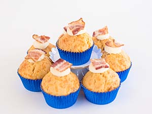 Dog treats that look like cupcakes topped with bacon