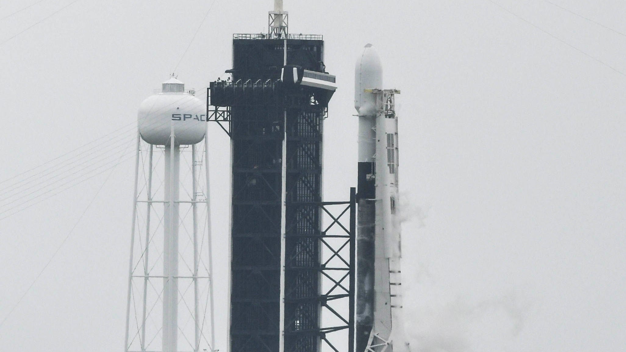 A SpaceX Falcon 9 rocket sits on pad 39A at Kenned