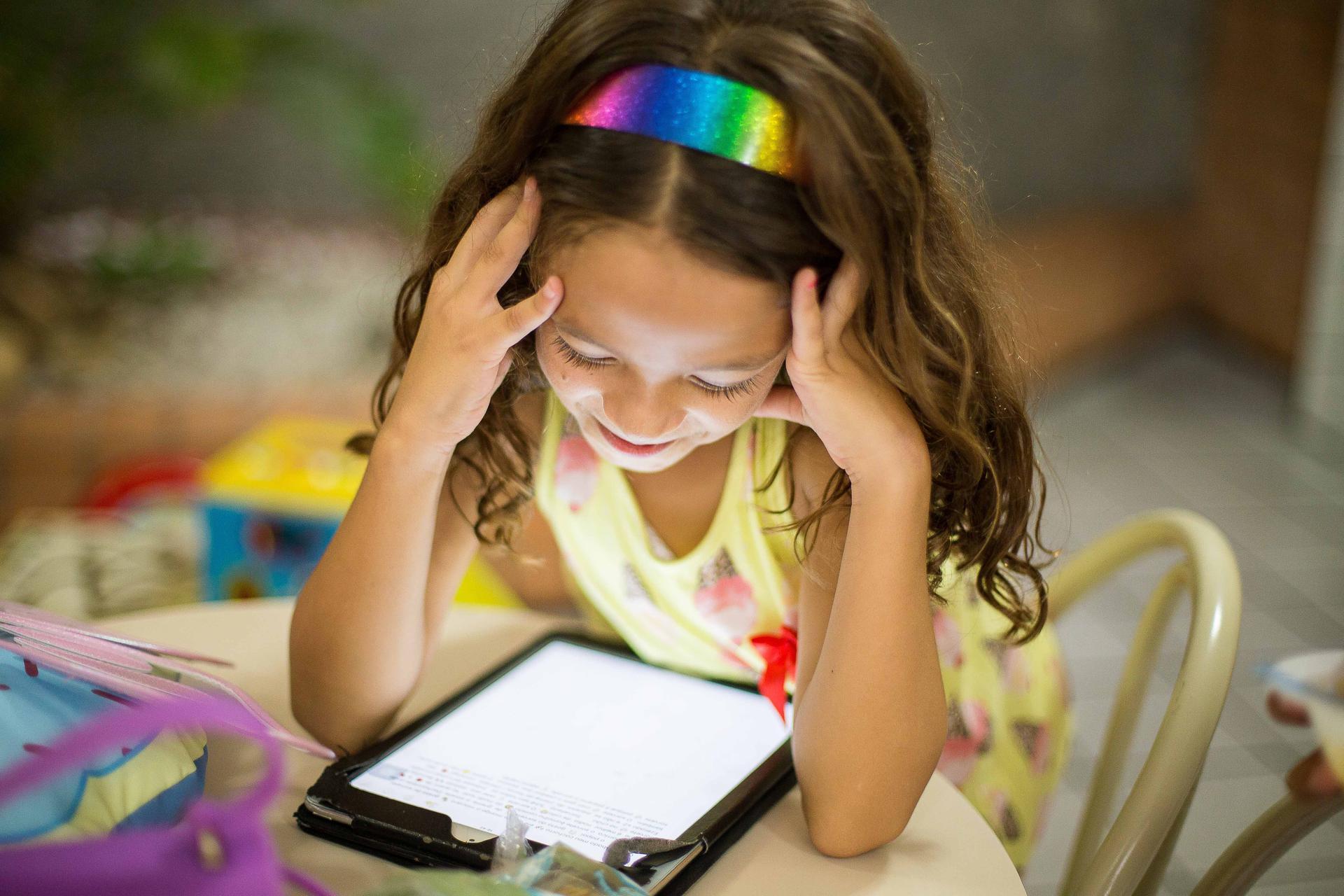 Girl Using e-Reader