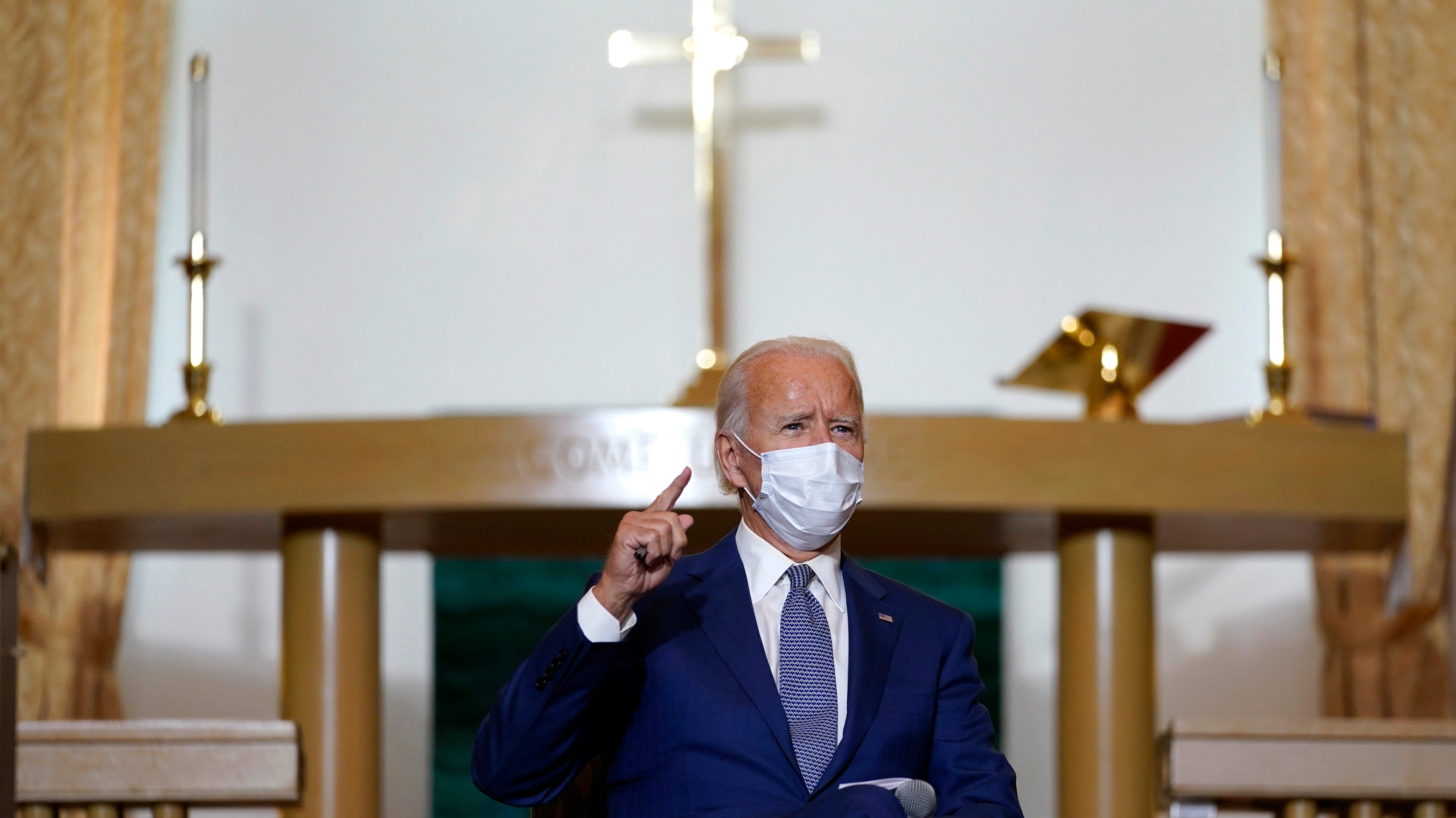 Democratic presidential candidate and former Vice President Joe Biden meets with community members at Grace Lutheran Church in Kenosha on Thursday.