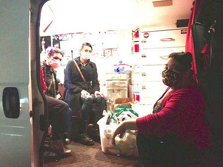 St. James Infirmary staff inside a van the organization uses for outreach. Courtesy of Celestina Pearl