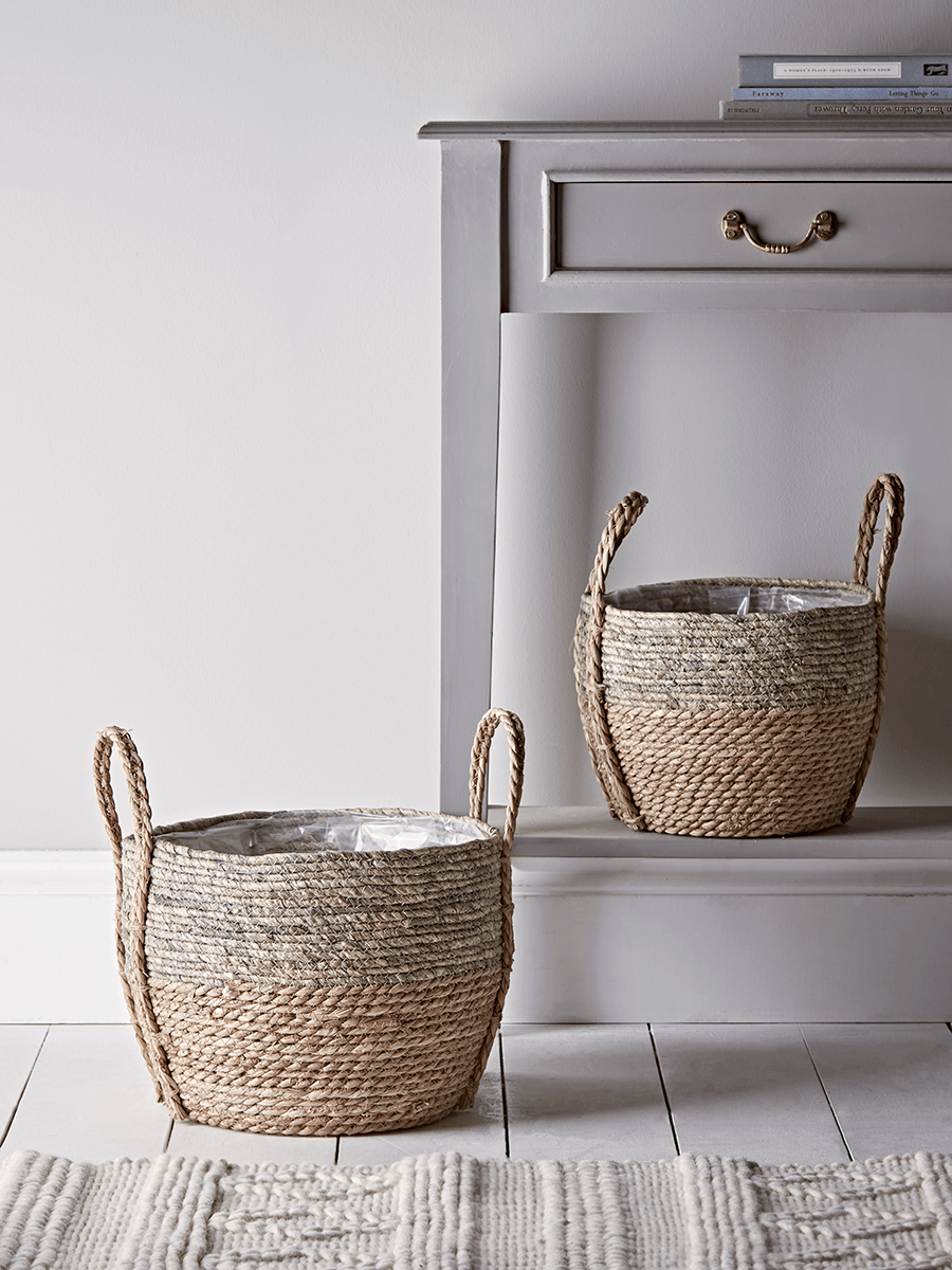 Two dipped straw baskets