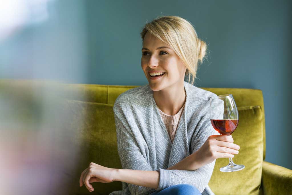 Woman with a glass of wine