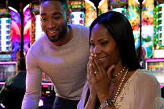 man and woman at a casino