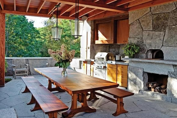 Outdoor kitchen with picnic table