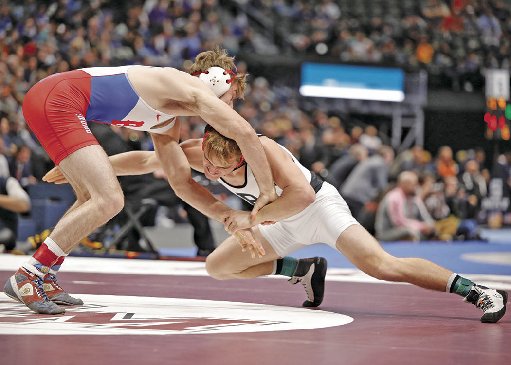 Neal state wrestling title breaks 'the curse'; Eagles finish eighth