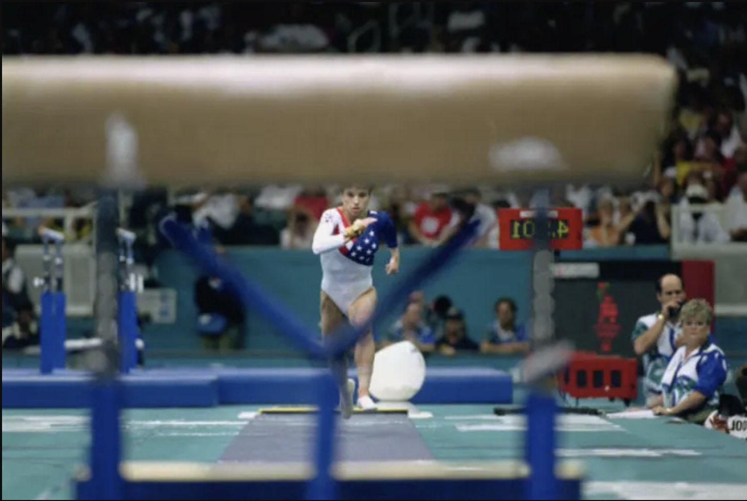Keri Strug runs toward the vaulting horse at the 1996 Olympics in Atlanta