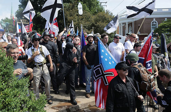 White Supremacists.  A gang of White men with Confederate and black and white flags.