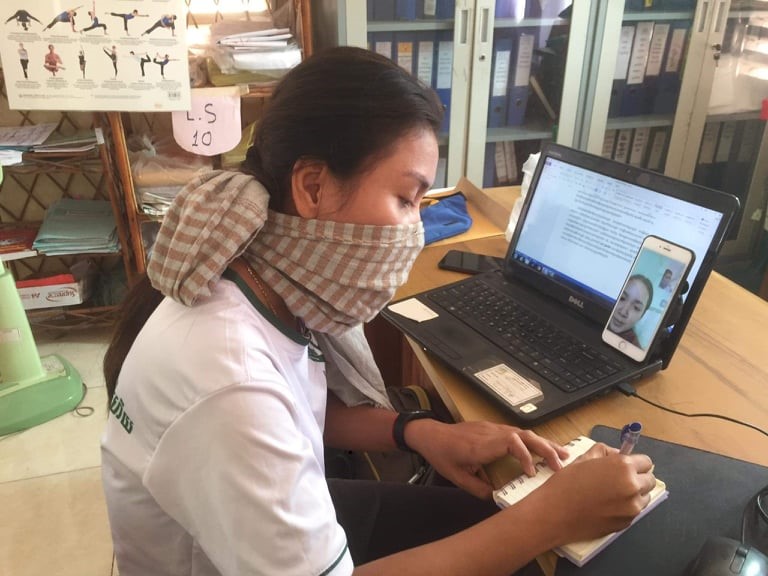 A distance learning mentoring session takes place in Cambodia