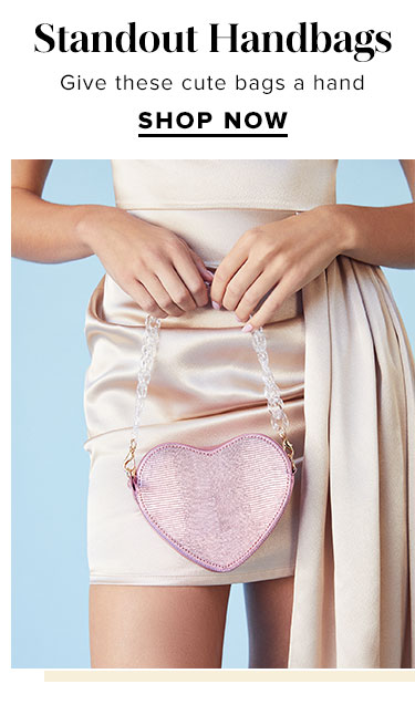 Statement Handbags. Give these cute bags a hand. SHOP NOW
