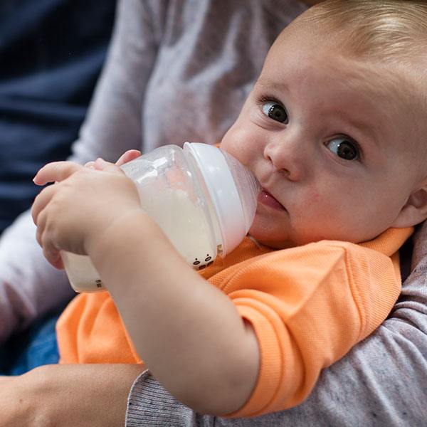 Baby feeding with Tommee Tipppe bottle
