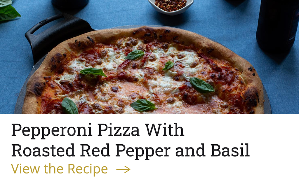 Pepperoni Pizza With Roasted Red Pepper and Basil [View the recipe-->]