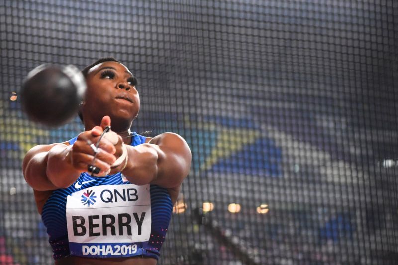 Gwen Berry preparing to throw the hammer for her track and field sport, hammer throwing.